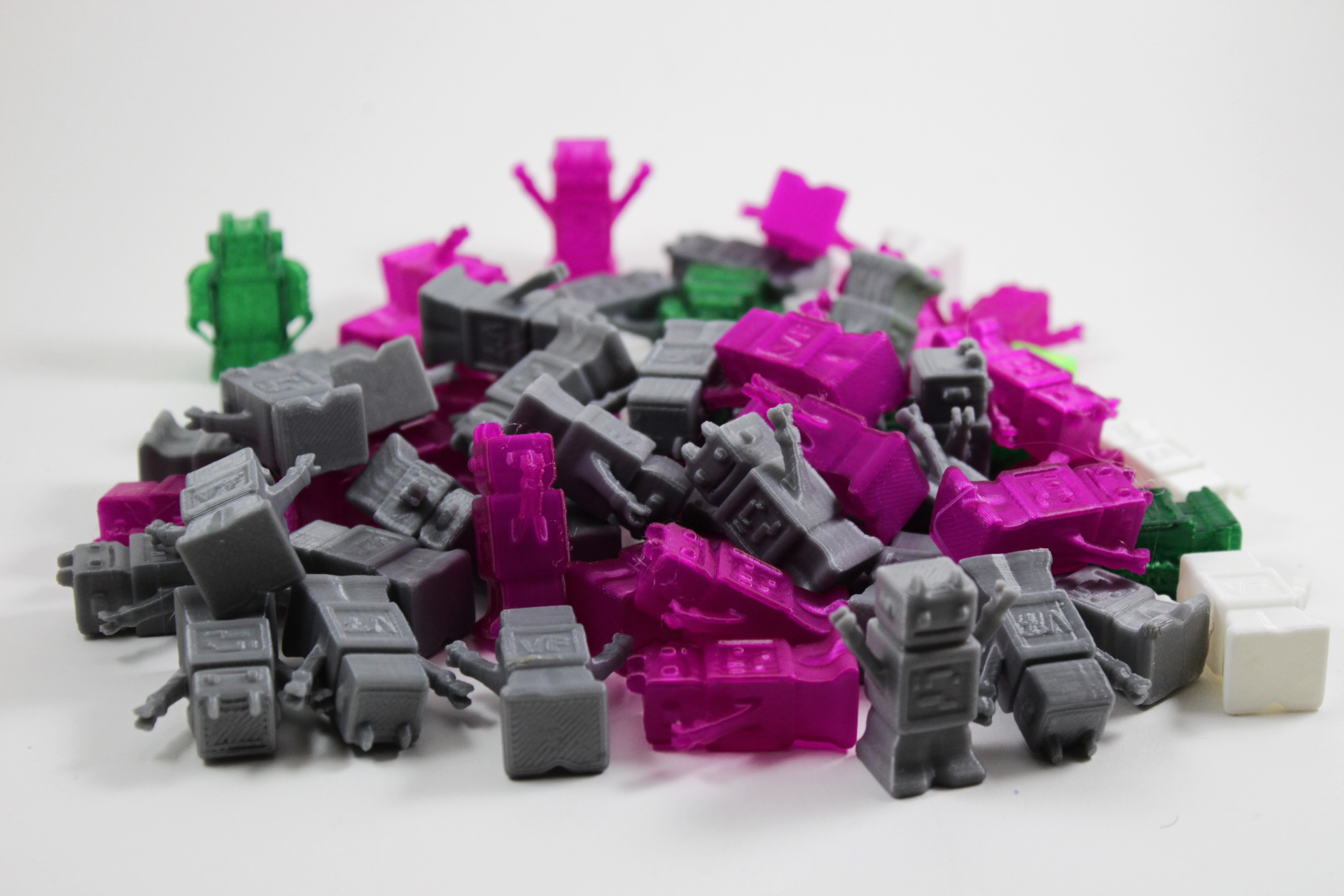 Large pile of 3D printed robots